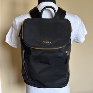 Tumi Black Backpack with gold-toned hardware